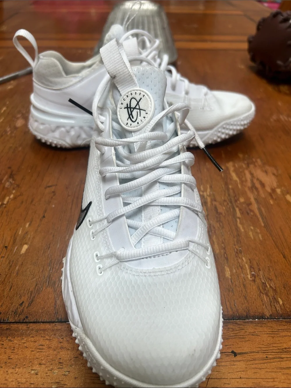 Nike Kids White Athletic Sneakers with Black Swoosh